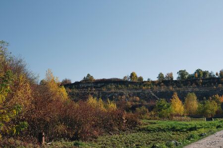 slope of a limestone quarry seen from a large distance