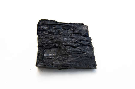detail of bituminous coal isolated over white background