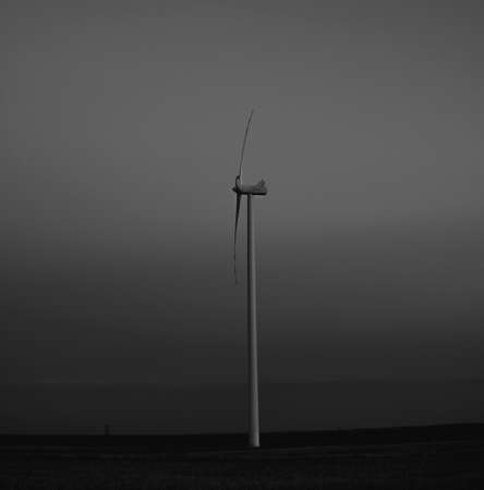 wind turbines in the field during end of the dayの写真素材