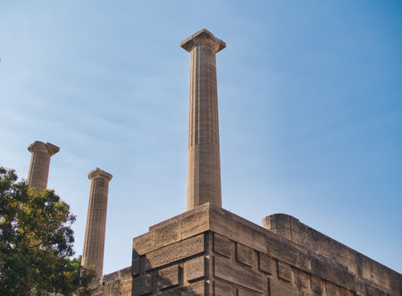 19 August 2022, Lindos, Greece: Ruins of the acropolis in the city of Lindos at island of Rhodes in...