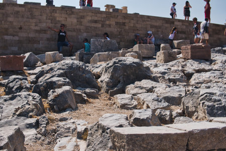 19 August 2022, Lindos, Greece: Ruins of the acropolis in the city of Lindos at island of Rhodes in Greeceのeditorial素材