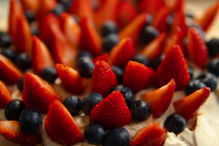 healthy cake with blueberries and strawberriesの写真素材