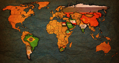 BRICS member countries and candidates flags on political world map with national bordersの写真素材