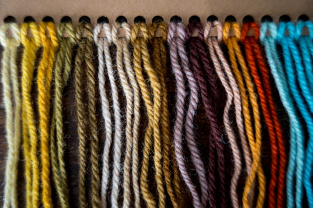 Close up of vibrant created from wool yarn in different colorsの写真素材