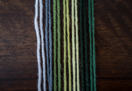 Close up of vibrant created from wool yarn in different colorsの写真素材