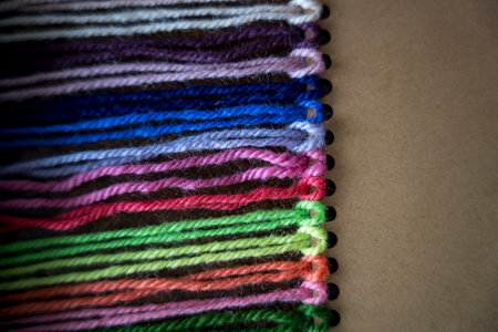 Close up of vibrant created from wool yarn in different colorsの写真素材