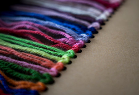 Close up of vibrant created from wool yarn in different colors