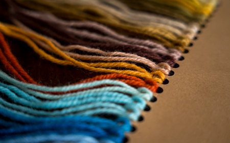 Close up of vibrant created from wool yarn in different colorsの写真素材