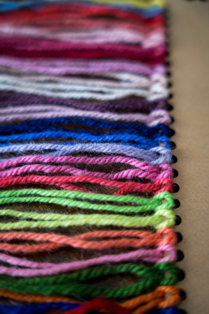 Close up of vibrant created from wool yarn in different colorsの写真素材