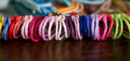 Close up of vibrant created from wool yarn in different colorsの写真素材