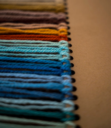 Close up of vibrant created from wool yarn in different colorsの写真素材