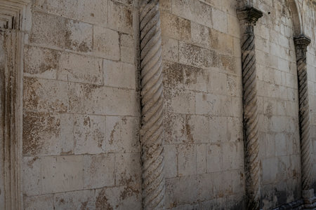 Pillars at the side wall of Church of Saint Chrysogonus in the city of Zadarの写真素材
