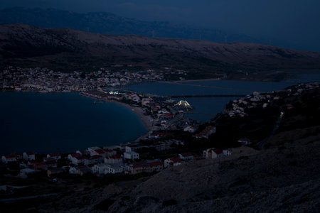 Landscape with a city of Pag in Croatia during summer eveningの写真素材
