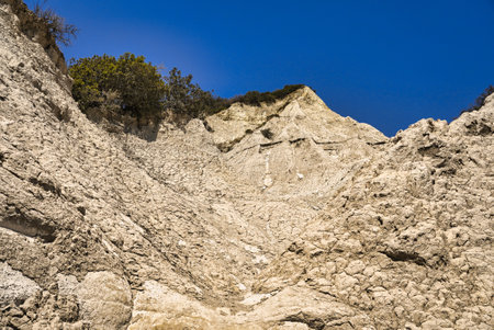 natural landscape formed by rainwater erosion depicting the earth pyramids at Komolithi in Creteの写真素材