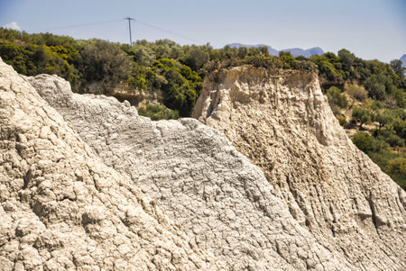 natural landscape formed by rainwater erosion depicting the earth pyramids at Komolithi in Creteの写真素材