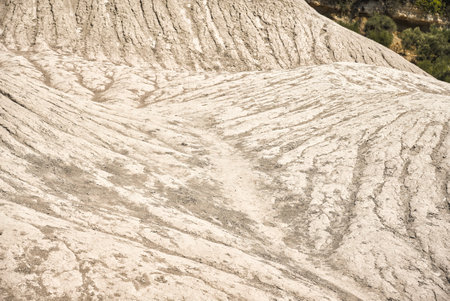 Detail of structures of eroded hills of Komolithi earth pyramids on the island of Creteの写真素材