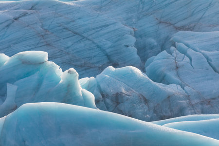 Beautiful glaciers flow through the mountains in Iceland.の写真素材