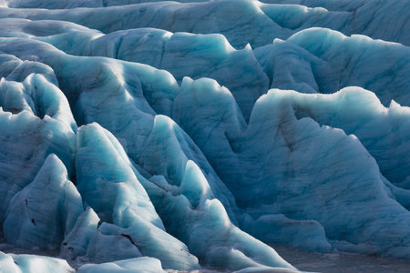 Beautiful glaciers flow through the mountains in Iceland.の写真素材