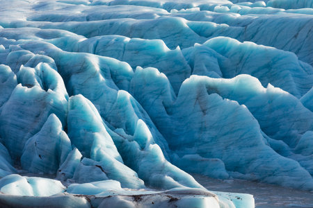 Beautiful glaciers flow through the mountains in Iceland.の写真素材