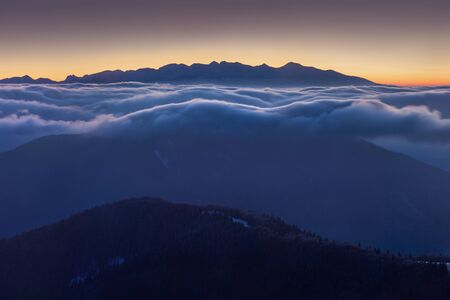 Fantastic evening and morning winter landscape. Colorful overcast sky.