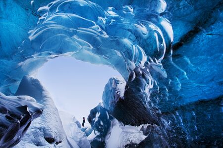 Blue crystal ice cave beneath the glacier. Amazing nature of Skaftafell, Iceland.