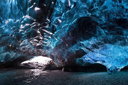 Blue crystal ice cave beneath the glacier. Amazing nature of Skaftafell, Iceland. Vatnajokull National Parkの写真素材
