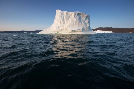 Greenland or Antarctica. Travel on ship among ices. Studying of global warming phenomenon Ices and...