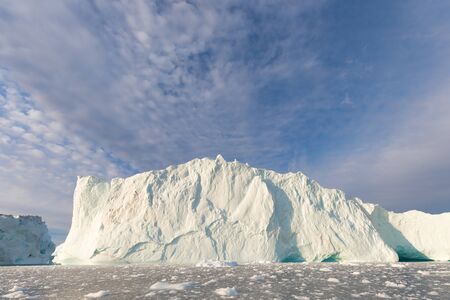Greenland or Antarctica. Travel on ship among ices. Studying of global warming phenomenon Ices and...