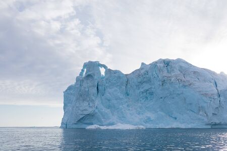 Greenland or Antarctica. Travel on ship among ices. Studying of global warming phenomenon Ices and...