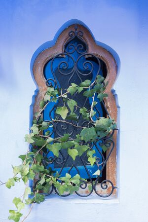 Traditional and typical moroccan architectural details in Chefchaouen, Morocco Africa Nice doors, windowsの写真素材