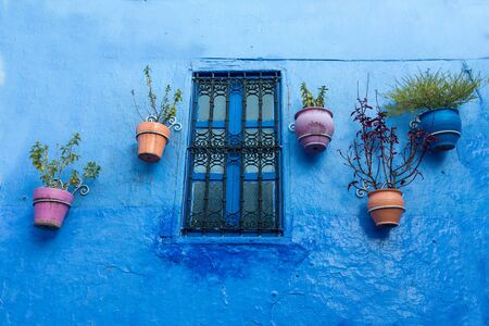Traditional and typical moroccan architectural details in Chefchaouen, Morocco Africa Nice doors, windowsの写真素材