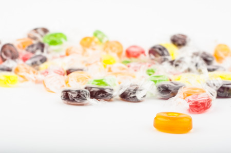 Group of colour hard candies on white backgroundの写真素材