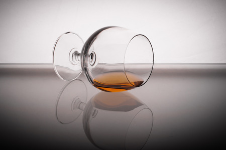Photo of cognac glass against white backgroundの写真素材