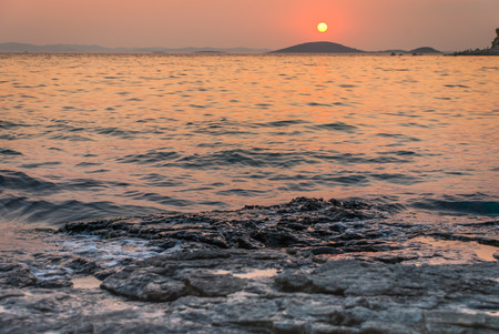 Photo of sunset over Kornati Islands, Murter, Croatiaの写真素材