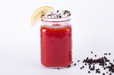 photo of Bloody mary cocktail in jarの写真素材