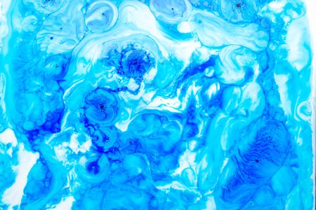 Photo of Abstract background from ink, milk and oil