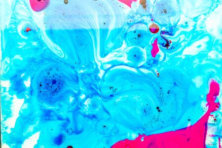 Photo of Abstract background from ink, milk and oil