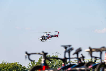 PORÄBKA NEAR BIELSKO-BIALA, POLAND - AUGUST 13, 2021: Cycling race "Tour de Pologne" 2021, stage 5 from Chocholow, Czarny Dunajec (pol. ChochoÅÃ³w) to Bielsko-BiaÅa, professional cyclist riding throught streets in PorÄbka, near Kocierz, Przegibek and のeditorial素材