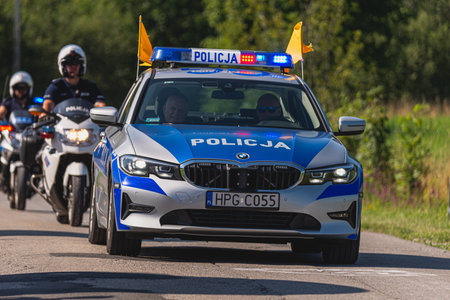 BUDZOW, POLAND - AUGUST 5, 2022: Cycling race "Tour de Pologne" 2022, stage 7 from Skawina to Krakow, professional cyclist riding uphill (KoM in BudzÃ³w)のeditorial素材