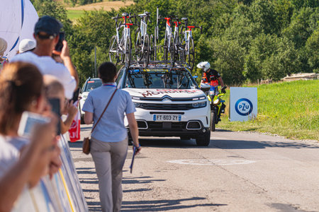 BUDZOW, POLAND - AUGUST 5, 2022: Cycling race "Tour de Pologne" 2022, stage 7 from Skawina to Krakow, professional cyclist riding uphill (KoM in BudzÃ³w)のeditorial素材