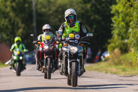 BUDZOW, POLAND - AUGUST 5, 2022: Cycling race "Tour de Pologne" 2022, stage 7 from Skawina to Krakow, professional cyclist riding uphill (KoM in BudzÃ³w)のeditorial素材