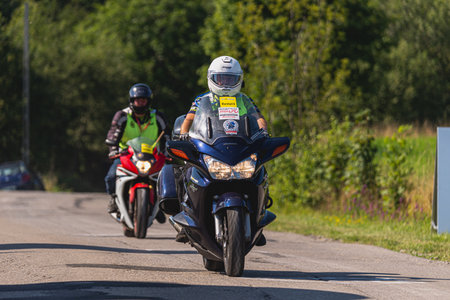 BUDZOW, POLAND - AUGUST 5, 2022: Cycling race "Tour de Pologne" 2022, stage 7 from Skawina to Krakow, professional cyclist riding uphill (KoM in BudzÃ³w)のeditorial素材