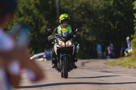 BUDZOW, POLAND - AUGUST 5, 2022: Cycling race "Tour de Pologne" 2022, stage 7 from Skawina to Krakow, professional cyclist riding uphill (KoM in BudzÃ³w)のeditorial素材