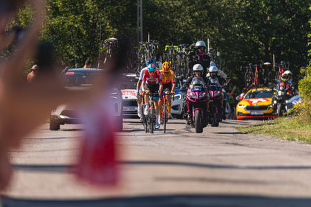 BUDZOW, POLAND - AUGUST 5, 2022: Cycling race "Tour de Pologne" 2022, stage 7 from Skawina to Krakow, professional cyclist riding uphill (KoM in BudzÃ³w)のeditorial素材