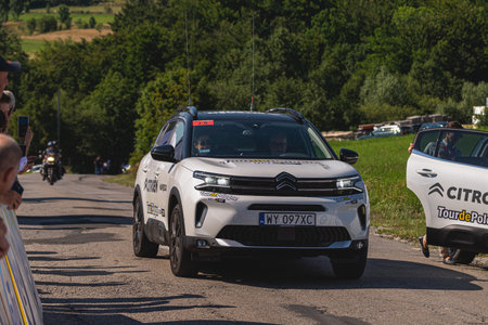 BUDZOW, POLAND - AUGUST 5, 2022: Cycling race "Tour de Pologne" 2022, stage 7 from Skawina to Krakow, professional cyclist riding uphill (KoM in BudzÃ³w)のeditorial素材