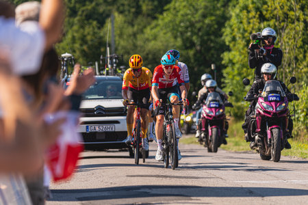 BUDZOW, POLAND - AUGUST 5, 2022: Cycling race "Tour de Pologne" 2022, stage 7 from Skawina to Krakow, professional cyclist riding uphill (KoM in BudzÃ³w)のeditorial素材