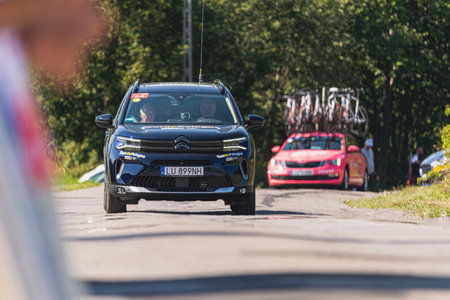 BUDZOW, POLAND - AUGUST 5, 2022: Cycling race "Tour de Pologne" 2022, stage 7 from Skawina to Krakow, professional cyclist riding uphill (KoM in BudzÃ³w)のeditorial素材