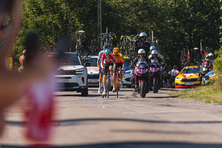 BUDZOW, POLAND - AUGUST 5, 2022: Cycling race "Tour de Pologne" 2022, stage 7 from Skawina to Krakow, professional cyclist riding uphill (KoM in BudzÃ³w)のeditorial素材