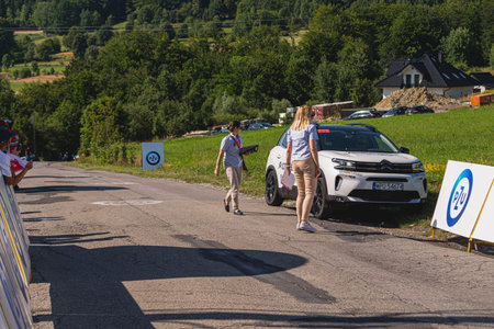 BUDZOW, POLAND - AUGUST 5, 2022: Cycling race "Tour de Pologne" 2022, stage 7 from Skawina to Krakow, professional cyclist riding uphill (KoM in BudzÃ³w)のeditorial素材