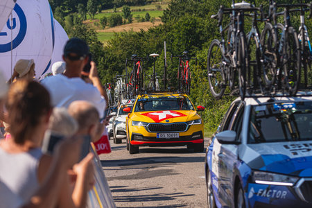 BUDZOW, POLAND - AUGUST 5, 2022: Cycling race "Tour de Pologne" 2022, stage 7 from Skawina to Krakow, professional cyclist riding uphill (KoM in BudzÃ³w)のeditorial素材